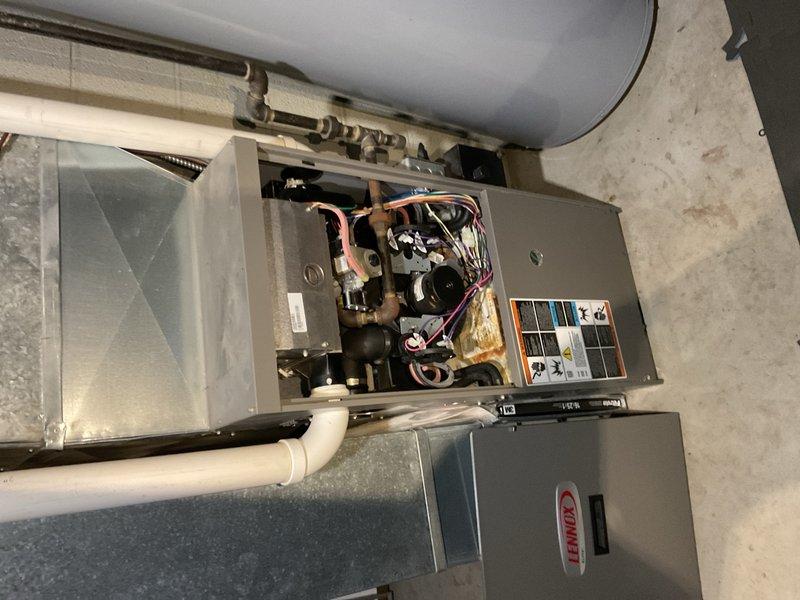 Responded to no-cooling complaint on 36-year-old Lennox R-22 system running continuously and unable to maintain temperature setpoint. Verified indoor airflow fundamentals including proper cooling speed tap on PSC blower motor, acceptable motor amperage, clean filter, and evaporator coil appearing clean via camera inspection. Performed refrigerant diagnostics on TXV system revealing low suction pressure, low head pressure, 31.5°F superheat, and 0°F subcooling—indicators of severely starved evaporator consistent with refrigerant loss. Due to equipment age, obsolete R-22 refrigerant, and company policy regarding R-22 repairs, recommended against repair. Arranged for senior technician dispatch to provide second opinion and confirm diagnosis before finalizing recommendations with customer.