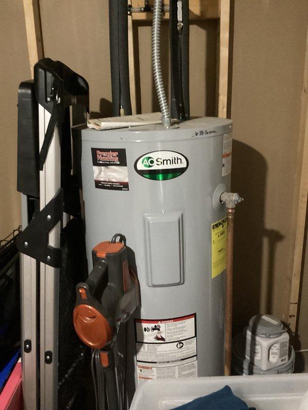 Responded to leaking garbage disposal under kitchen sink. Upon inspection, determined unit had reached end of serviceable life with leak originating from deteriorated housing seals. Presented replacement options to customer, who elected to convert to standard drain configuration instead of installing new disposal unit. Removed failed garbage disposal, disconnected electrical connection and drain lines, and installed conventional P-trap drain assembly to restore proper sink drainage function.