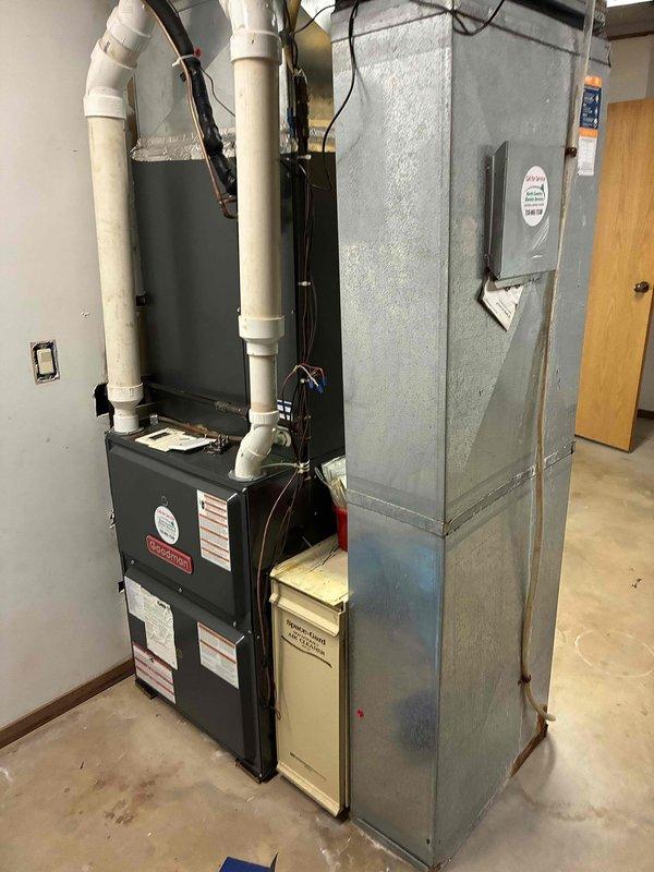 Responded to no cooling call on 1999 air conditioning system. Upon inspection, discovered burned wire disconnected from contactor and failed compressor capacitor. The deteriorated capacitor caused excessive current draw, resulting in wire overheating and burning off the contactor terminal. Replaced both contactor and capacitor to restore system operation. Verified proper amperage draw on compressor to confirm no additional electrical issues. Performed condenser coil rinse, verified air filter condition, and cleared condensate drain line. System operational with 20-degree temperature differential across evaporator coil, indicating proper refrigerant charge and airflow. Provided maintenance plan information via email and scheduled comfort advisor visit to assess air exchanger installation request.
