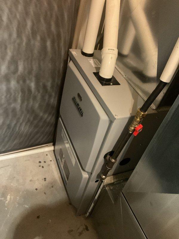 Completed annual maintenance tune-up on 12-year-old geothermal heat pump system and gas furnace. Serviced geothermal unit including flushing condensate lines, adding water to ground loop, inspecting capacitor and contactor (both operational), and verifying proper temperature differential across system. Inspected gas furnace and identified excessive condensation accumulation from intake manifold collecting inside cabinet; advised homeowner that permanent resolution would require plugging intake line. All other furnace components inspected and operating within normal parameters. Both heating and cooling systems functioning properly upon completion of comprehensive tune-up service.