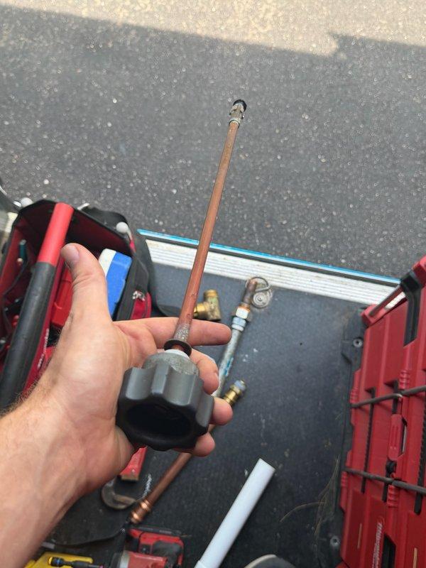 Responded to outdoor spigot malfunction with steady leak and inoperative handle. Diagnosed broken handle assembly and failed hose bib stem causing water flow issues. Removed defective components, installed replacement stem, and fitted new handle to restore full functionality of exterior faucet.