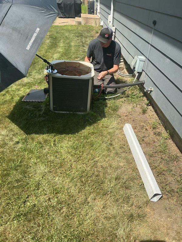 Responded to no cooling call on 10+ year old air conditioning system with breaker tripping issue. Upon arrival, found outdoor condenser unit experiencing repeated electrical trips preventing operation, resulting in warm air from supply vents. Diagnosed failed capacitor as root cause of breaker trips. Replaced defective capacitor and restored unit to normal operation. Verified refrigerant charge levels were within manufacturer specifications. Measured supply air temperature at 59°F, confirming proper cooling performance. Given the age of the system and recent failure, recommended customer consider replacement options to avoid future breakdowns and improve efficiency.