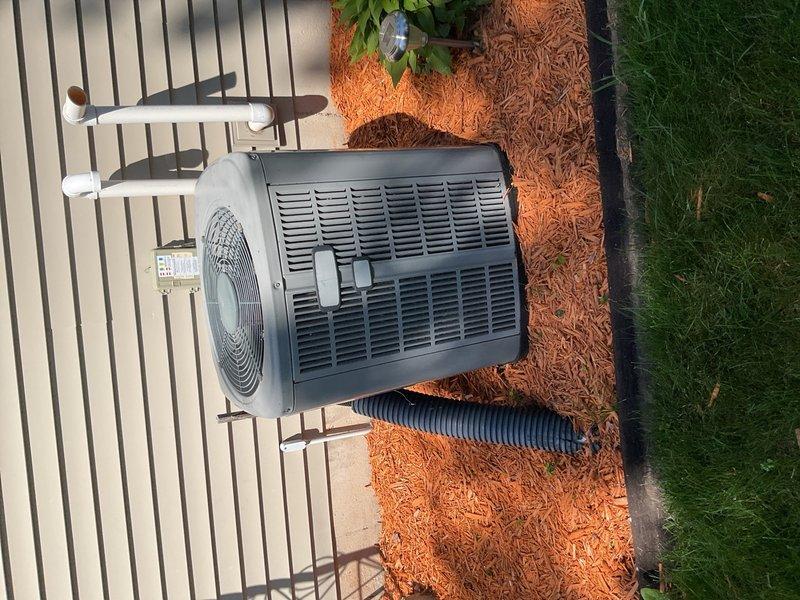 Responded to no cooling complaint on 20-year-old R-22 central air conditioning system. Upon arrival, confirmed thermostat calling for cooling but unit failing to provide adequate cooling capacity. Performed comprehensive diagnostic evaluation of outdoor condensing unit including pressure testing, amperage draw measurement, and temperature analysis at 95°F outdoor ambient conditions.

Diagnostic findings revealed mechanically weak compressor with severely degraded internal efficiency. Measured operating pressures of 86.2 psig suction and 211 psig discharge, both significantly below normal specifications for R-22 system at current ambient temperature. Compressor amperage draw measured 4.25A against rated load amperage of 8.7A RLA, indicating insufficient mechanical compression. Discharge line temperature recorded at only 103°F, further confirming lack of compression efficiency and heat of compression.

Combined diagnostic data conclusively indicated internal compressor failure with loss 