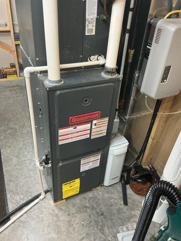 Responded to service call for air conditioning system not starting properly. Diagnosed failed dual run capacitor on outdoor condensing unit. Replaced defective capacitor with new unit from truck stock, restoring proper compressor and fan motor operation. System tested and verified operational upon completion.