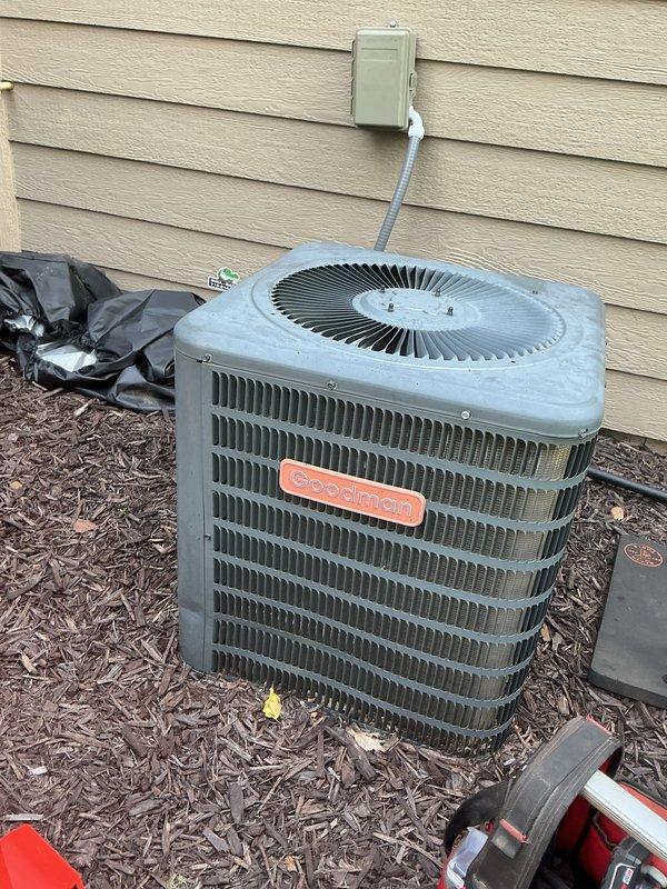 Responded to service call for air conditioning system not starting properly. Diagnosed failed dual run capacitor on outdoor condensing unit. Replaced defective capacitor with new unit from truck stock, restoring proper compressor and fan motor operation. System tested and verified operational upon completion.