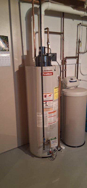 Responded to service call for 50-gallon LP tanked water heater experiencing intermittent hot water production. Upon arrival, unit was operational but homeowner reported ongoing reliability issues with inconsistent performance. After thorough assessment and discussion of repair versus replacement options, homeowner authorized complete water heater replacement. Successfully installed new A.O. Smith ProMax tanked water heater with proper copper piping connections, pressure relief valve with discharge pipe, hot and cold water supply lines with shutoff valves, and expansion tank. All plumbing connections tested and verified for proper operation and leak-free performance.