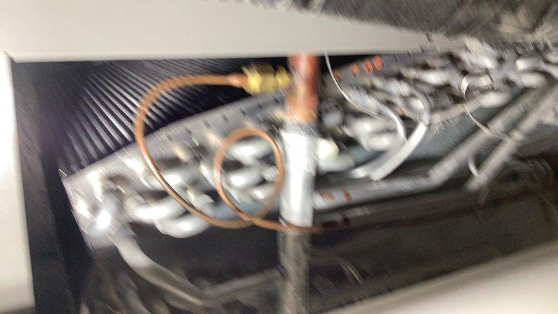 Performed comprehensive air conditioning maintenance on Lennox HVAC system. Inspected evaporator coil, blower assembly, and replaced air filter with homeowner-supplied filter. Evaluated condenser unit, condenser coil, contactor, compressor, and associated components. Verified refrigerant charge levels within manufacturer specifications. Cleaned condenser coil to optimize heat transfer efficiency. Tested zone dampers and confirmed proper operation across all zones. Verified thermostat functionality and system response. Inspected and cleaned air exchanger interior. System operating normally with all components functioning within acceptable parameters.