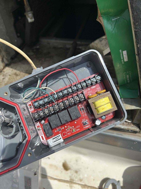 Responded to no cooling complaint on commercial rooftop unit serving kitchen area with interior temperatures reaching 80-90 degrees. Diagnosed failed smoke detector preventing system operation, bypassed detector to restore cooling functionality. Accessed electrical control panel, inspected relay board and wiring connections, and successfully restored unit to normal operation.
