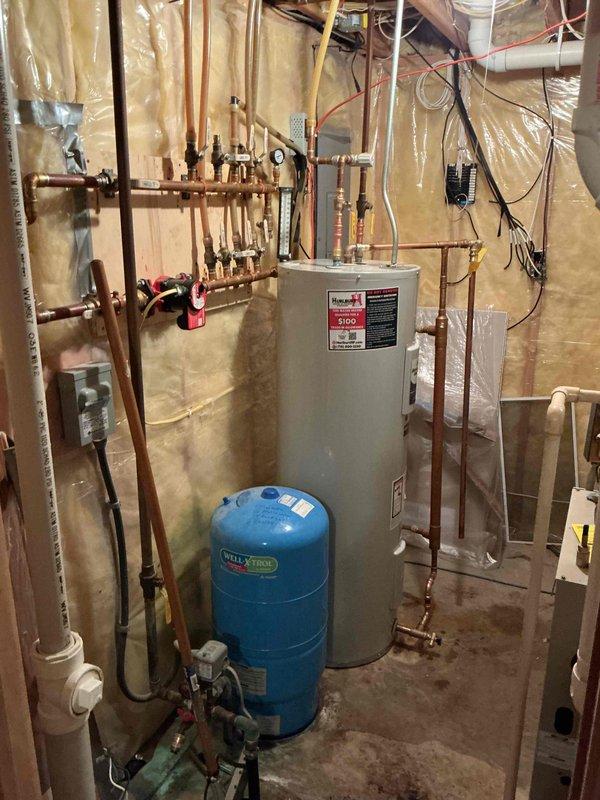 Responded to a water heater failure with active leaking and no hot water production. Upon inspection, determined the existing tanked water heater was beyond repair and required complete replacement. Successfully removed the failed unit and installed a new tanked water heater with proper connections to existing copper supply lines, pressure relief valve, and electrical service. Verified all plumbing connections for leaks, confirmed proper operation of the new water heater, and ensured the system was functioning correctly with adequate hot water delivery.