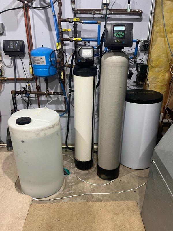 Responded to clogged toilet caused by broken bidet component. Used drain snake to successfully clear obstruction and remove plastic piece from toilet trap, restoring proper drainage and function.