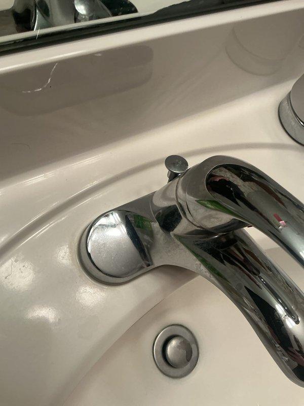 Completed comprehensive plumbing service addressing multiple fixtures throughout the residence. Repaired leaking outside water spigot by tightening connections and installed new toilet seat mounting bolts to secure loose seat. Replaced reverse osmosis system filters and installed drain plugs for bathroom sink, kitchen sink, and bathtub drain mechanism. Assessed low water pressure issue in tub/shower area and installed new high-quality shower head to improve flow and performance.