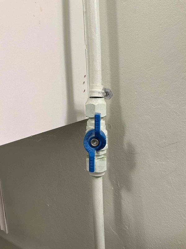 Responded to gas leak emergency at dryer location that had been yellow-tagged by utility company. Upon inspection, identified two loose fittings on the gas line supply piping adjacent to the dryer unit. Disassembled the compromised fittings, applied fresh pipe sealant, and properly reassembled and torqued connections to manufacturer specifications. Performed comprehensive leak detection testing using soap solution on all gas line connections and joints to verify system integrity. Confirmed no further leaks present and restored safe operation of gas supply line to appliance.