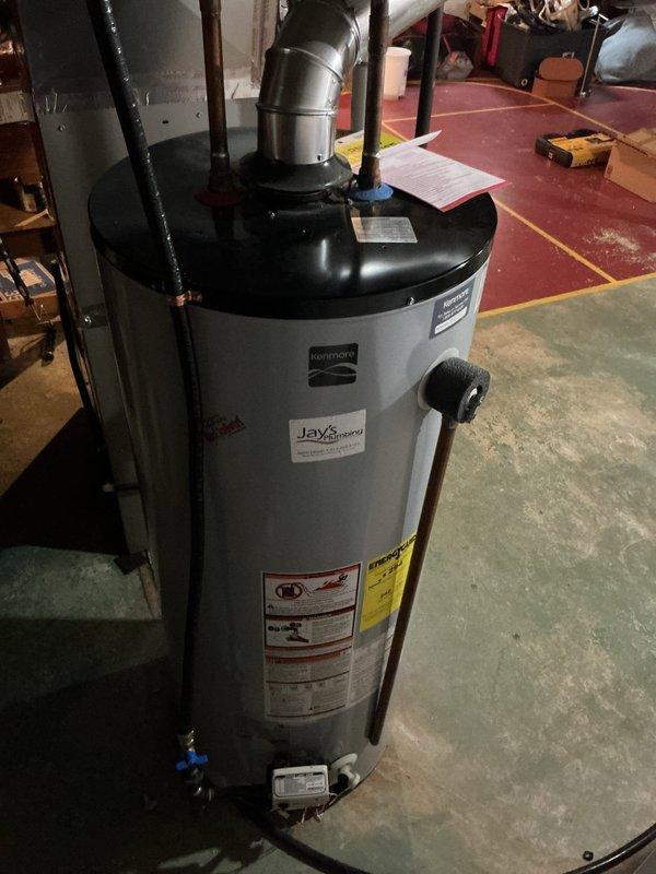 Responded to no-gas condition at water heater following recent gas line installation. Upon arrival, confirmed water heater was not receiving gas supply and pilot would not ignite. Inspected gas supply piping, shut-off valve, and connections to the unit. Identified gas supply issue preventing proper operation of the water heater. Documented existing equipment condition, including aged plumbing components with visible corrosion on brass fittings and shut-off valve assembly. Provided replacement options and pricing for new water heater installation to restore hot water service to the property.