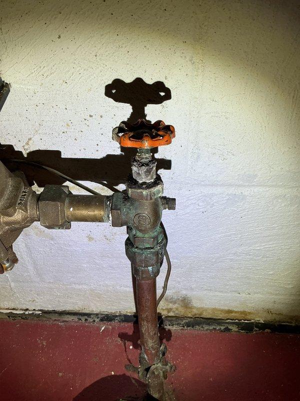 Responded to no-gas condition at water heater following recent gas line installation. Upon arrival, confirmed water heater was not receiving gas supply and pilot would not ignite. Inspected gas supply piping, shut-off valve, and connections to the unit. Identified gas supply issue preventing proper operation of the water heater. Documented existing equipment condition, including aged plumbing components with visible corrosion on brass fittings and shut-off valve assembly. Provided replacement options and pricing for new water heater installation to restore hot water service to the property.