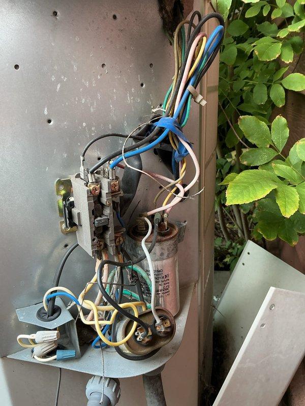 Responded to no cooling complaint on 10-year-old central air conditioning system. Upon inspection, diagnosed compressor as locked and non-functional. Reviewed system condition with consideration for unit age and provided customer with options for either compressor replacement or full system replacement given the age and condition of existing equipment.