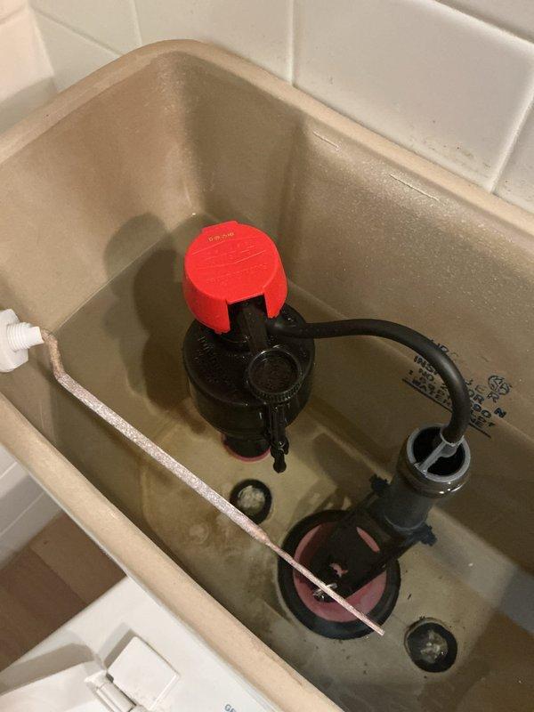 Responded to service call for lavatory sink drain backup and shower head low pressure issues. Upon diagnostic inspection, verified the shower head was restricting flow due to internal debris buildup. Attempted to clear debris but pressure remained inadequate, determining shower head replacement will be necessary. Investigated lavatory sink drain and confirmed blockage, likely caused by hair accumulation. Additionally identified a dripping cold side faucet caused by worn cartridge and a continuously running toilet due to faulty fill valve requiring replacement.

Performed drain cabling on lavatory sink, successfully extracting hair ball obstruction from the line. Tested drain flow and verified proper operation restored. Removed and replaced toilet fill valve assembly, testing to confirm toilet now functions correctly without continuous running. Removed and replaced cold side faucet cartridge, verifying elimination of drip and proper operational function. All completed repairs tested and