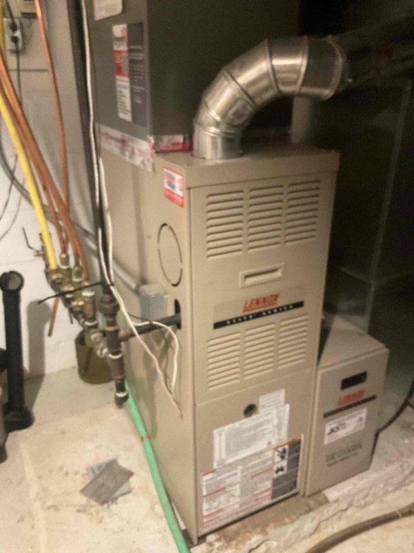 Completed non-member air conditioning tune-up service on three residential HVAC units of unknown age. Performed comprehensive maintenance including inspection of indoor furnace components and outdoor condensers. Identified and addressed dirty condenser coils by thoroughly cleaning debris and buildup to restore proper airflow and system efficiency. Inspected Lennox Premier Series furnace, associated ductwork, humidifier components, air filtration system, copper refrigerant lines, gas connections, and electrical controls. Discussed membership benefits and preventative maintenance program options with customer per their request. All three units operational upon service completion.