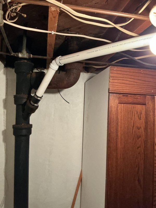 Responded to basement floor drain backup issue. Tested drainage system by running water through fixtures with no immediate problems observed. Performed preventative air ram treatment on floor drain line to ensure proper flow. Replaced defective tub waste and overflow assembly along with tub drain connection to restore proper drainage. Identified aging water supply lines requiring future repipe consideration.