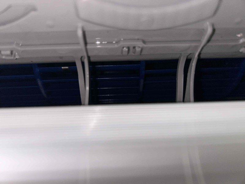 Performed comprehensive cleaning of ductless mini-split indoor unit, including blower wheel and evaporator coil. Utilized cleaning bib for containment and coil jet cleaning system to remove accumulated debris and restore optimal airflow through the heat exchanger fins. Unit returned to proper operating condition with improved air circulation efficiency.