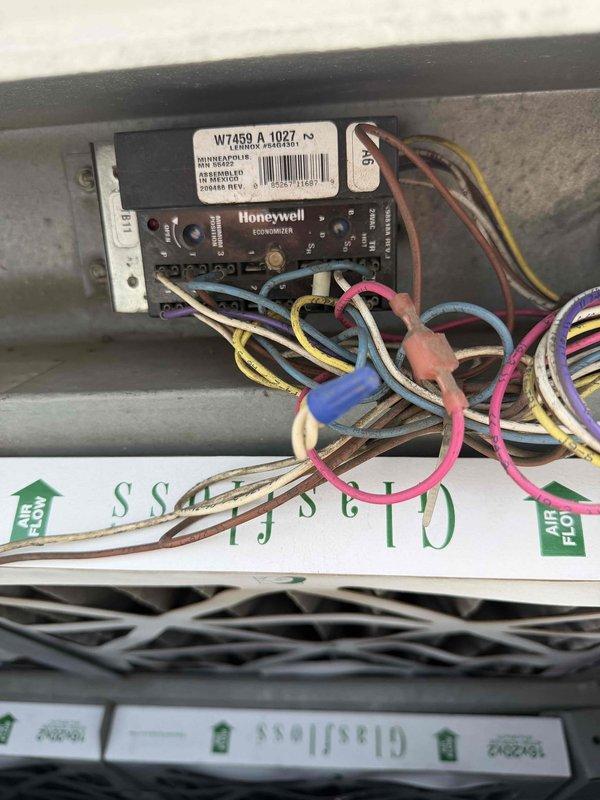 Responded to no cooling complaint on commercial rooftop unit. Upon arrival, determined system was operational with no mechanical failures. Investigation revealed wildfire smoke infiltration through economizer damper during operation. Confirmed no jumper pin was installed in economizer control, allowing outdoor air intake during smoke conditions. Advised customer to power unit off during evening hours and restart in morning to minimize smoke entry until air quality improves.