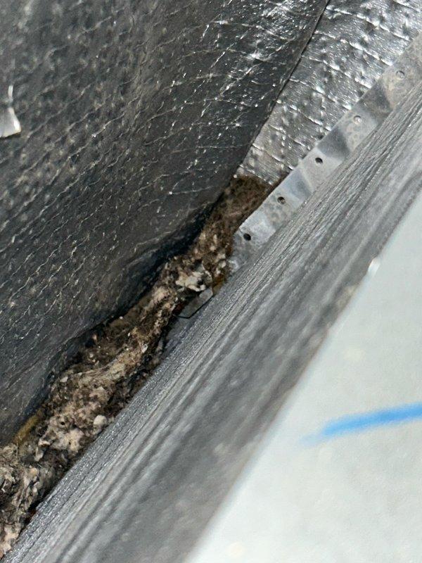 Completed annual AC tune-up and system performance check on residential air conditioning unit. Outdoor condenser coil was heavily impacted with dirt and debris, restricting airflow, and was thoroughly cleaned during service. Return air filter was heavily loaded with particulate buildup and replaced with new filter. 

Upon inspection, evaporator coil displayed significant buildup and debris accumulation along fins and surfaces, reducing heat transfer efficiency and restricting airflow across the coil. Documented condition with photographs showing contamination at coil base and ductwork seams. Recommended professional evaporator coil cleaning to restore optimal system performance and efficiency.

Outdoor contactor exhibited visible wear, pitting on contact surfaces, and electrical degradation indicating imminent failure risk. Recommended contactor replacement to prevent system shutdown and ensure reliable operation during peak cooling season.