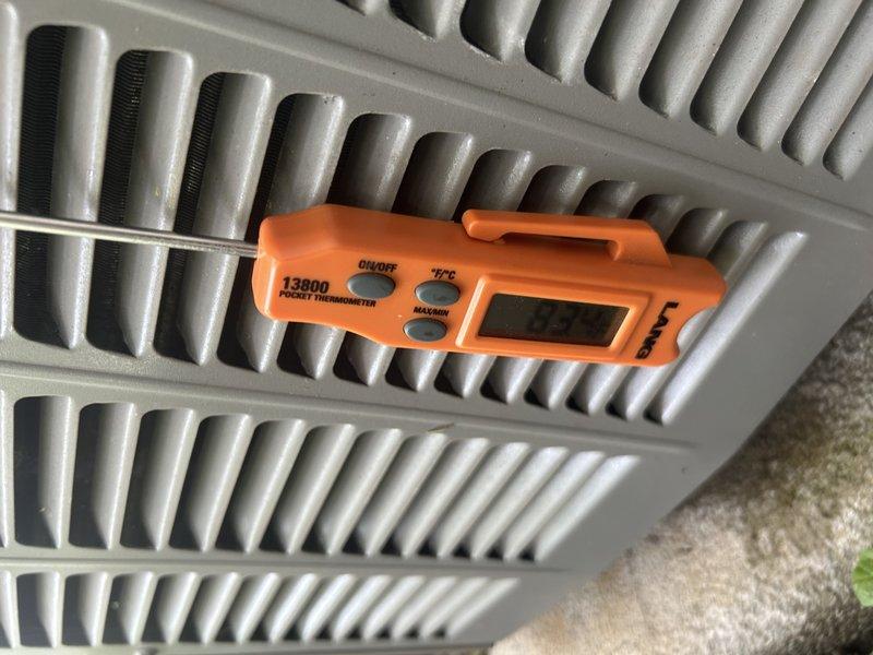 Responded to no cooling complaint on 2-year-old Lennox system displaying error codes 00a8 and 00c1 with reported evaporator coil freeze-up and water leakage under furnace. Upon arrival, system was operating normally with adequate cooling and coil was thawed. Verified air filter and condenser coil were clean per homeowner maintenance. Connected manifold gauges and placed unit in charge mode for diagnostic testing. Confirmed refrigerant pressures and temperatures within manufacturer specifications for 2-ton system. Verified high cooling airflow was properly configured. Adjusted system airflow settings to optimize performance: increased low cooling airflow CFM, increased dehumidification mode airflow, and increased continuous fan speed to address reported weak airflow. System tested successfully with proper operation and no freeze-up conditions observed at completion.