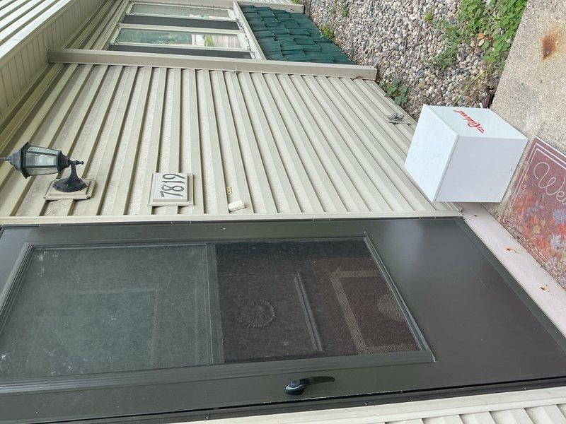 Responded to a no-cooling complaint on a 15-year-old central air conditioning system at a duplex unit. Upon arrival, found the thermostat set to heat mode; when switched to cooling, the system failed to activate. Removed thermostat from wall plate and discovered a bent terminal prong preventing proper electrical contact. Straightened the bent prong, verified battery installation, and reinstalled thermostat to wall plate. Cycled system through heating and cooling modes to confirm proper operation. System restored to full cooling functionality with no additional repairs required.