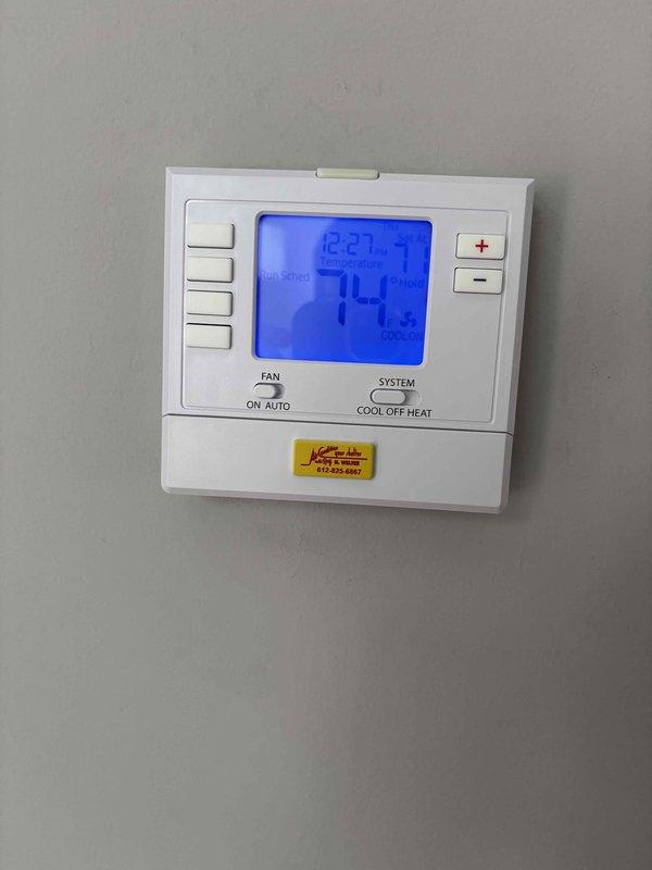Completed annual maintenance on 1-year-old residential air conditioning system with 410A refrigerant under family rewards agreement. Performed comprehensive inspection of indoor air handler including filter, condensate drain, blower motor, electrical wiring, and all components with satisfactory results. Verified proper temperature split across evaporator coil. Inspected outdoor condensing unit including condenser coil cleanliness and capacitor condition. Measured and recorded amp draw on compressor motor, fan motor, and contactor within manufacturer specifications. Checked refrigerant charge by measuring operating temperatures and pressures at 89-degree ambient outdoor temperature, confirming proper charge levels. All electrical connections, safety controls, and mechanical components verified operational. System operating normally with no deficiencies noted at time of service completion.