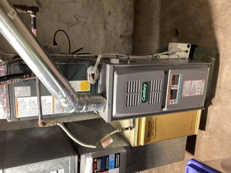 Responded to reported water leak dripping down the back of refrigerator into basement. Upon arrival, inspected the affected area and traced the source of moisture. Determined that the water drip originated from a bottle of baby distilled water stored on top of the refrigerator, not from any plumbing system failure. Conducted thorough inspection of surrounding areas, including water supply lines, drain connections, and nearby plumbing fixtures to rule out any actual leaks. No plumbing defects or active leaks were identified during the comprehensive inspection.