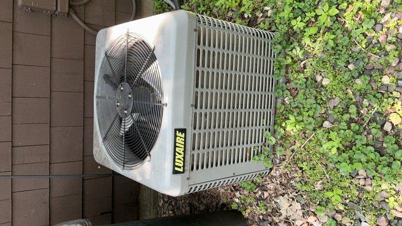 Completed comprehensive AC tune-up on Luxaire system in response to upper floor cooling concerns. Performed thorough inspection of indoor air handler, verifying blower speeds and confirming basement damper was properly closed per homeowner preference. Noted air filter condition requires replacement soon, though homeowner maintains their own replacement schedule. Evaluated airflow at supply vents and confirmed proper cold air delivery throughout system.

Identified that upper floor heat retention is primarily attributed to lack of insulation combined with solar heat gain, rather than equipment malfunction. Venting showed adequate airflow with appropriate temperature differential.

Conducted complete outdoor condenser unit maintenance including coil rinsing to remove debris and dirt accumulation, cleaned interior of unit, and performed electrical component inspection. Tested and verified capacitor readings within manufacturer specifications, inspected contactor for proper operation and w