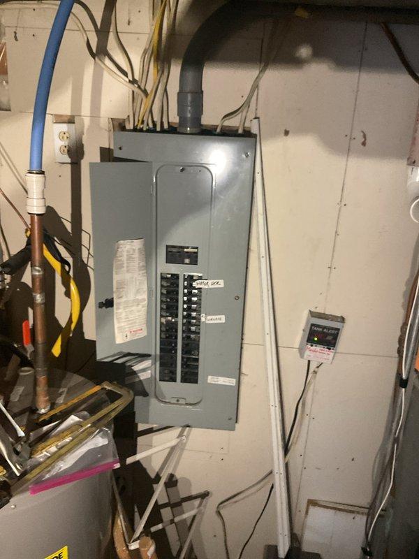 Performed air conditioning tune-up on rental property unit. Found condensing coil completely plugged with debris, causing inadequate cooling performance. Thoroughly cleaned and washed out coil, restoring proper airflow. Verified system operation with refrigerant diagnostics showing 18° superheat and 8° subcooling, with satisfactory temperature drop across evaporator coil. Noted poor installation quality of air handler and furnace by previous contractor. Customer disconnected thermostat to reconnect to smart device after service completion.