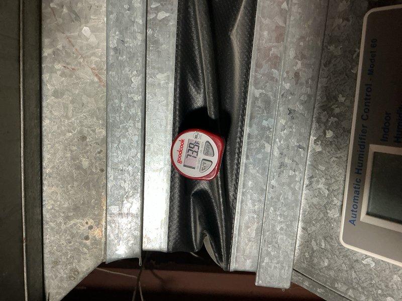 Responded to no cooling callback on 2-3 month old AC system that had shut down with fan error code after outdoor unit became blocked with cottonwood debris. Upon arrival, system was operational as homeowner had already cleaned exterior coil approximately 45-50 minutes prior, clearing the obstruction and restoring normal function. Verified system performance with delta-T reading of 21°F across evaporator coil, confirming adequate cooling capacity. Inspected outdoor coil condition and noted satisfactory cleaning by homeowner. Observed air filter requiring replacement, which homeowner will complete same day. No error codes present at time of inspection and all system functions operating within normal parameters.