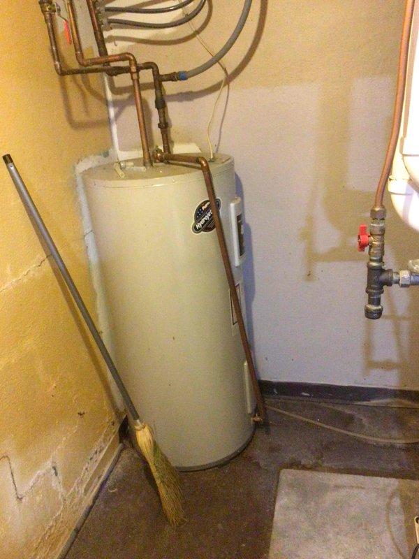 Responded to callback for AC system not adequately cooling during afternoon heat. Performed refrigerant charge check with readings of 295 PSI liquid line at 82°F and 115 PSI suction at 60°F. Identified airflow issues including an open return vent behind temporary wall pulling cold basement air into system. Closed problematic return vent, verified all supply vents were open and return vents unobstructed. Reduced blower speed by approximately 170 CFM to optimize system performance and dehumidification. Recommended monitoring system performance over next 24-48 hours to evaluate effectiveness of airflow corrections.