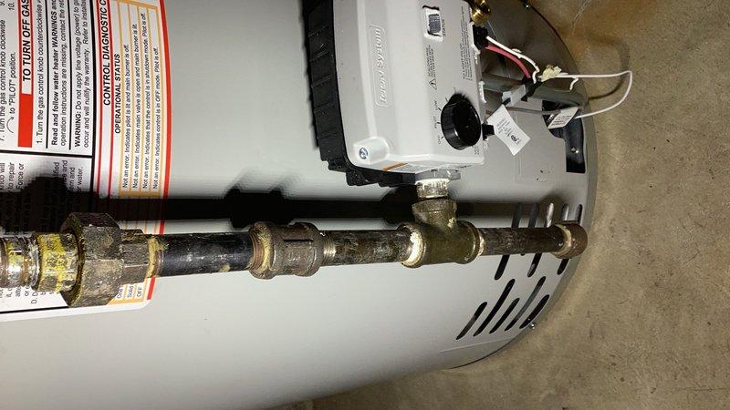 Responded to a gas leak emergency at a water heater that had been tagged and shut off by the utility company. Multiple leaks were identified at the union connection and piping section above the union. Removed defective gas fittings and replaced the elbow, union, tee, and associated gas pipes with new components. Performed comprehensive leak checks on all replaced fittings and connections to the water heater, as well as the gas regulator and system fittings. Relit the water heater pilot light, verified proper operation of the range, and confirmed the entire gas system returned to normal operation.