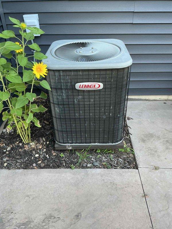 Performed annual cooling maintenance on a 21-year-old Lennox air conditioning system. Inspection revealed capacitor reading well outside manufacturer specifications and causing damage to the compressor, which is operating near maximum amp draw. Contactor tested good, refrigerant charge is at proper levels, condenser coil is clean, control board is functioning properly, and blower wheel is clean. Temperature drop measured at 20 degrees and within specification. Noted dirty furnace filter requiring replacement. Discussed findings and available options with homeowner and scheduled service advisor visit for further consultation.