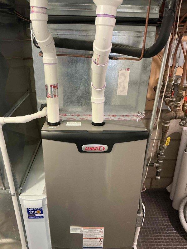 Completed annual spring cooling tune-up on residential HVAC system including one air conditioning unit and one dehumidifier. Performed comprehensive AC inspection revealing unit operational but drawing higher than normal amperage. Installed hard start kit to reduce compressor startup current and improve electrical efficiency. Inspected Lennox furnace installation, refrigerant lines, and associated electrical components including outdoor capacitor and wiring connections. Verified proper operation of all equipment following service completion.