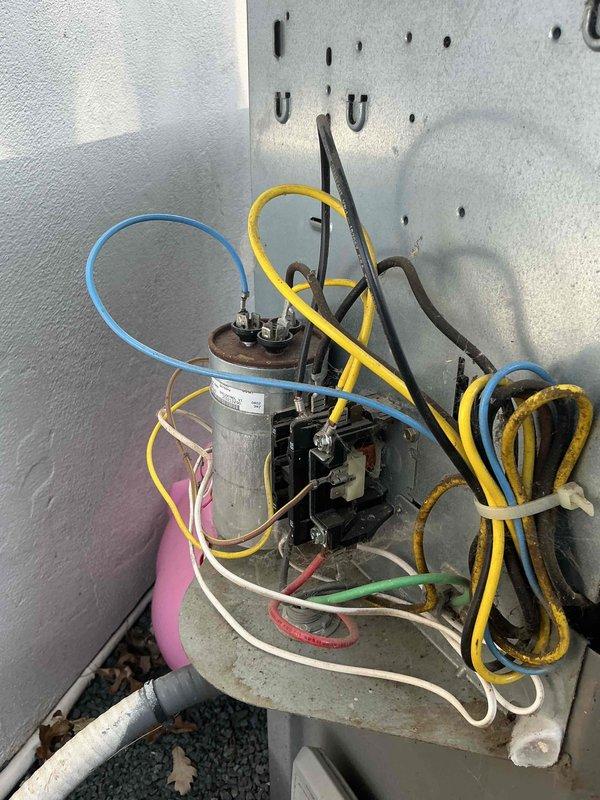 Completed annual spring cooling tune-up on residential HVAC system including one air conditioning unit and one dehumidifier. Performed comprehensive AC inspection revealing unit operational but drawing higher than normal amperage. Installed hard start kit to reduce compressor startup current and improve electrical efficiency. Inspected Lennox furnace installation, refrigerant lines, and associated electrical components including outdoor capacitor and wiring connections. Verified proper operation of all equipment following service completion.