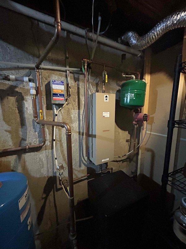 Completed comprehensive AC tune-up maintenance with no pre-existing issues reported. Cleaned condenser coil, inspected electrical connections confirming proper operation, replaced air filter, and cleared condensate drain line. System operating efficiently with 18-degree temperature differential across evaporator coil, indicating proper refrigerant charge and airflow.