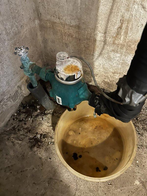 Responded to service call for plumbing issues in basement area. Replaced defective water gate ball valve junction at main shut-off location in cellar. Installed new backflow preventer with anti-siphon device for exterior hose connection, as previous installation lacked required backflow prevention. Both the main shut-off valve and backflow prevention system were non-compliant and required immediate replacement to ensure proper water system protection and code compliance.