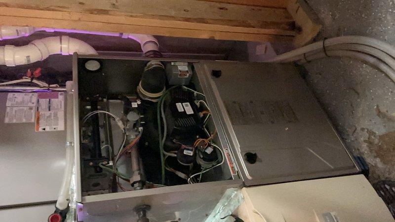 Responded to no cooling complaint on 7-year-old Lennox R-410A system that was cycling on and off with thermostat error codes. System had experienced airflow restriction due to severely clogged air filter and outdoor coil blocked with cottonwood debris during recent high ambient temperatures in the 90s, causing unit to shut down on safety. Upon arrival, homeowner had already rinsed outdoor coil and replaced air filter. Performed comprehensive system diagnostics including control board operation, refrigerant charge verification, temperature split across evaporator coil, airflow measurements at multiple blower speeds, and visual inspection of outdoor coil cleanliness. All tested components and parameters found to be within normal operating specifications. System restored to proper cooling operation with no further issues identified.