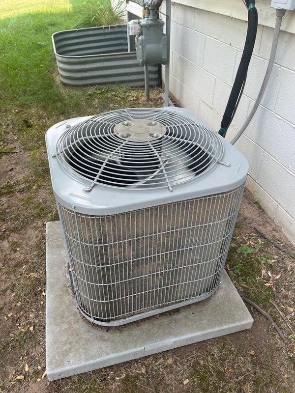 Responded to a no cooling complaint on a 9-year-old residential air conditioning system. Upon arrival, found the thermostat set to 68°F while indoor temperature read 73°F, with the outdoor unit blowing warm air. Diagnosed a failed capacitor on the outdoor condenser unit as the cause of the cooling failure. Replaced the defective capacitor and restored normal system operation.