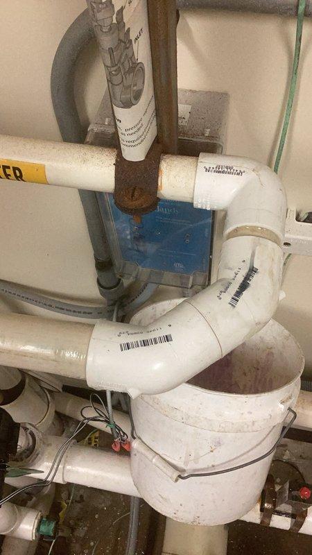 Responded to emergency call for leaking 1-inch PVC pipe in pool room mechanical area. Upon arrival, identified active leak at 90-degree elbow joint on non-potable water inlet line. Shut off water supply, removed failed PVC 90 fitting, and installed new elbow with proper primer and solvent cement. Utilized rubber coupling connectors to ensure secure, watertight seal at pipe joints. Restored water flow and pressure-tested all connections to verify complete leak elimination with no further dripping or seepage detected.