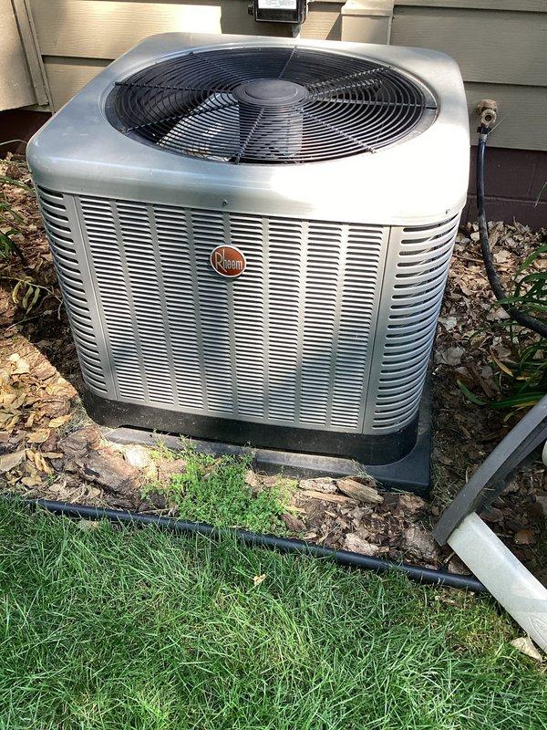Responded to no-cool call on 12-year-old Rheem residential air conditioning system, model RA1624AJ1NA. Upon arrival, confirmed outdoor condenser unit was not operating and condenser fan motor was not running. Verified electrical power supply to unit was active and disconnect switch was in the on position. Inspected outdoor unit and found condenser fan motor had failed, preventing proper heat rejection and resulting in minimal cooling capacity. Tested capacitor, contactor, and control board to isolate failure to fan motor assembly. Explained repair options and system age considerations to homeowner given unit's 2018 manufacture date.