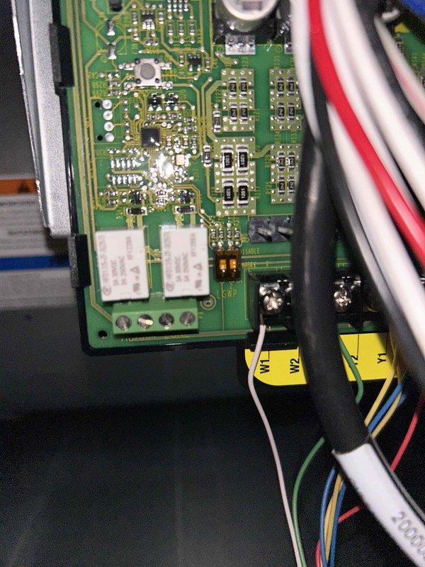 Responded to warranty call for newly installed AC system with continuous blower operation in auto mode and elevated humidity readings of 70-75% on thermostat. Upon inspection, diagnosed faulty RDS (return duct sensor) causing blower to run continuously regardless of thermostat settings. Documented control board wiring and sensor connections with photos. System requires return visit to replace defective sensor and restore proper auto-mode functionality.