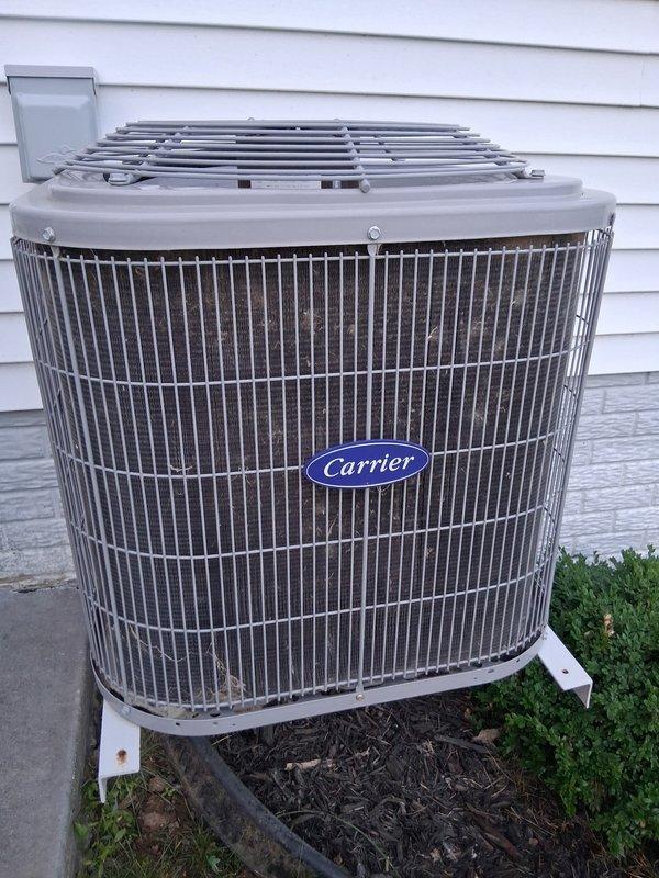 Responded to no cooling complaint on 7-year-old Carrier central air conditioning system. Upon inspection, identified failed capacitor as root cause of system malfunction. Removed defective capacitor and installed new replacement capacitor. System startup and operational testing confirmed proper function with 20-degree temperature split across evaporator coil, indicating adequate cooling performance restored.