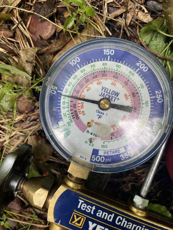 Responded to no cooling complaint at commercial property. Diagnosed and replaced failed fan capacitor. Upon testing system operation, noticed inadequate cooling performance and connected manifold gauges, which revealed low refrigerant charge. Due to multiple system issues and age of equipment, recommended full system replacement evaluation be conducted.