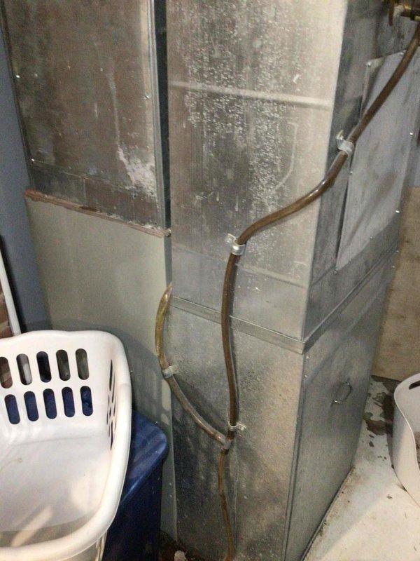 Responded to no cooling complaint on residential HVAC system. Upon arrival, confirmed unit was running but delivering insufficient cold air. Connected manifold gauges to assess refrigerant charge and found system operating significantly below proper levels. Identified system as R-22 refrigerant type dating from 1994, approximately 30 years old. Due to low refrigerant charge in aging R-22 system and phase-out considerations, provided repair estimates and scheduled follow-up consultation to discuss replacement options given system age and refrigerant availability concerns.