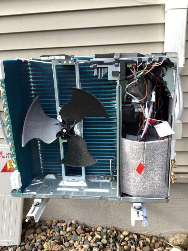 Responded to no cooling complaint on recently installed Mitsubishi Electric split system heat pump (Model MUZ-FX12NLHZ, R454B refrigerant). Upon arrival, performed comprehensive diagnostic evaluation finding no active error codes, proper system operation with 22-degree temperature split across coil, and refrigerant pressures within manufacturer specifications. Consulted with technical support to verify all parameters and documented case number for reference. Inspected outdoor unit components including condenser coils, fan assembly, capacitor, and electrical connections—all functioning normally. Customer advised that intermittent issue may require monitoring for error code retrieval from outdoor unit if problem recurs.