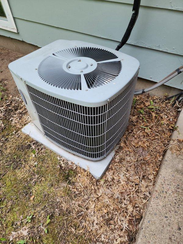 Responded to no cooling complaint on 10-year-old system. Diagnosed failed outdoor capacitor preventing compressor operation. Indoor air handler blower and capacitor tested good, air filter found clean. Replaced defective outdoor unit capacitor, verified proper refrigerant pressures, and confirmed 20-degree temperature split across evaporator coil. Cleaned condenser coil during capacitor replacement to ensure optimal heat transfer and system efficiency. System restored to normal cooling operation.