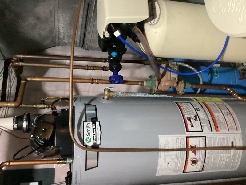 Responded to service call for tanked water heater experiencing leaking from the temperature and pressure relief valve with indicator light flashing. Upon inspection, confirmed active leak at relief valve and assessed potential tank compromise. Successfully replaced defective temperature and pressure relief valve to restore proper system operation and eliminate water discharge. System tested and verified operational following repair.
